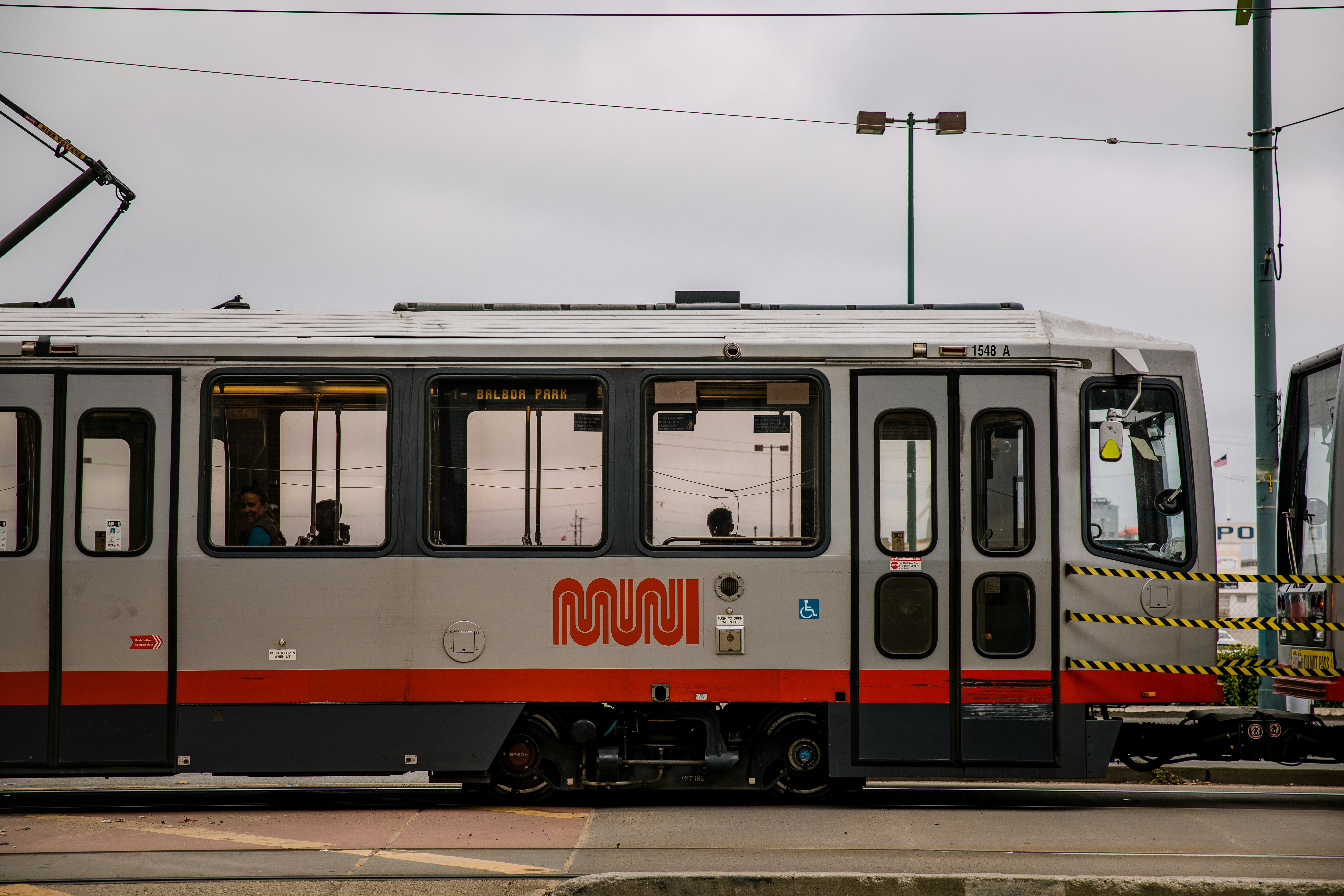 gray and red train